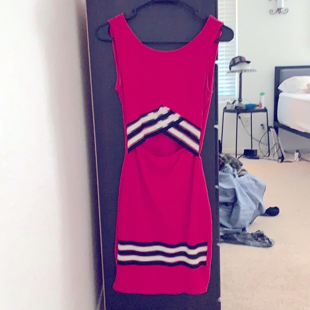 Body fitting midriff cut out mini dress